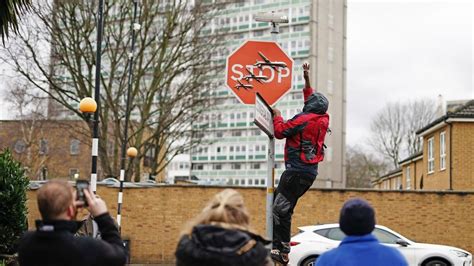 Now you see it, now you don’t: Banksy stop sign taken from London street soon after it appears